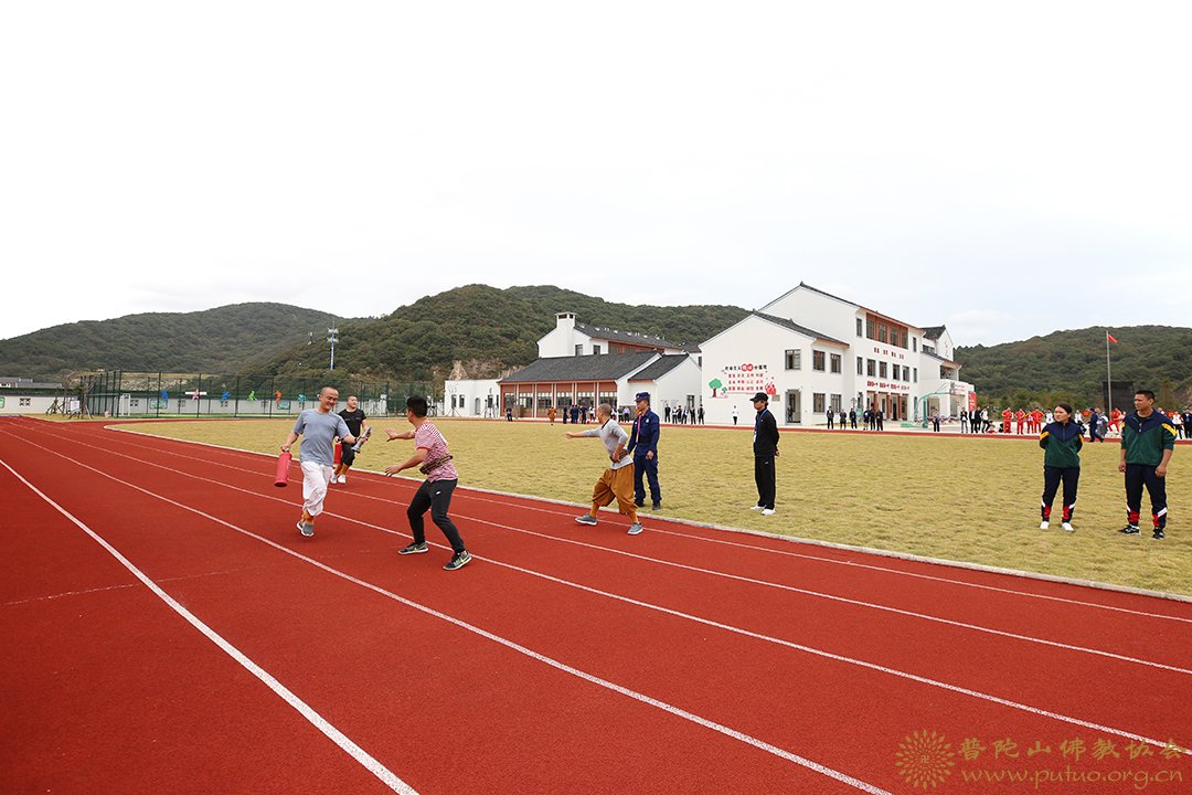 普陀山-会长道慈大和尚出席第六届普陀山-朱家尖功能区“佛国卫士杯”消防运动会开幕式